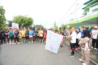 Pj Wali Kota Kotamobagu, Asripan Nani canangkan Car Free Day, (Foto: Diskominfo KK).