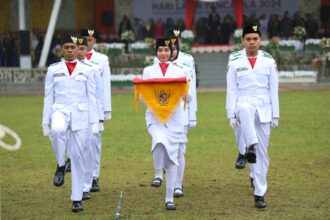 RESMI: Pj Wali Kota Kotamobagu resmi mengukuhkan 36 paskibraka tahun 2024, (Foto: Diskominfo KK).