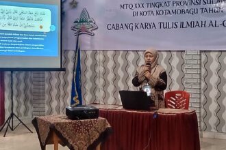 Nurul Magfirah Supu, peserta KTIQ dari Bolmong saat presentasi, (Foto: ZONAUTARA.com/Sajidin Kandoli).