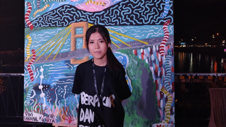 Vivi Tanamal, muralis perempuan asal Minahasa Utara, (Foto: ZONAUTARA.com/ Gitta Waloni).