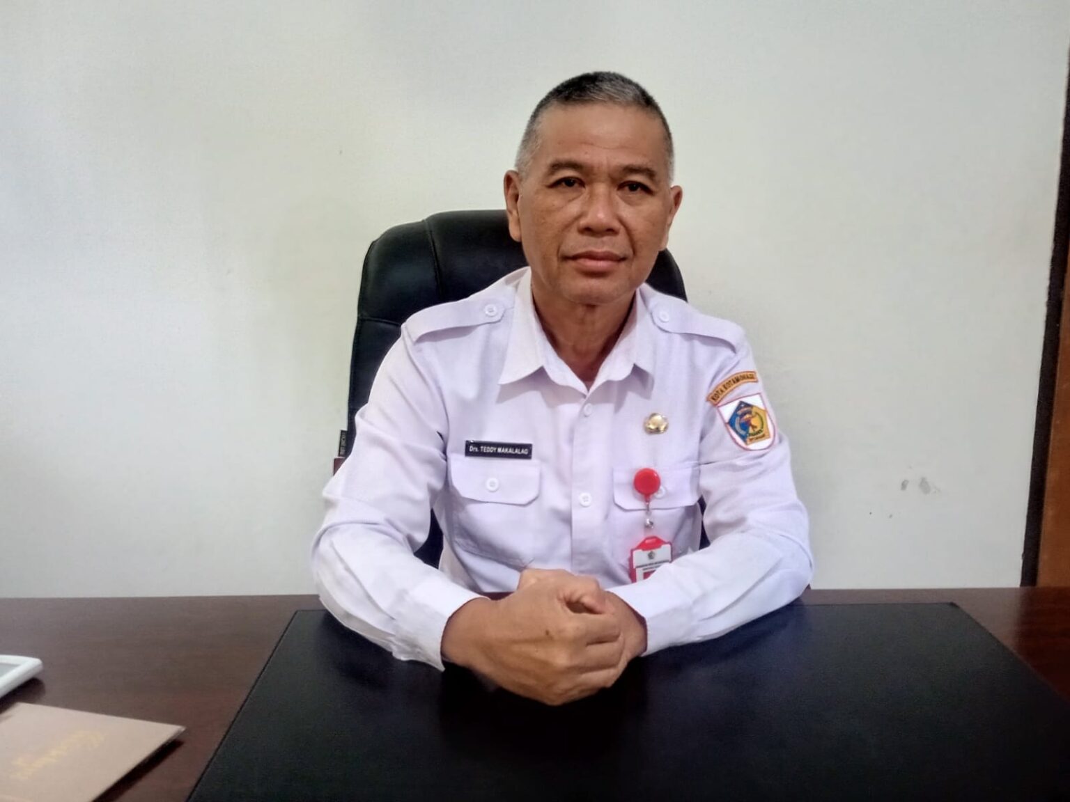 Kepala Dinas PMD Kota Kotamobagu, Teddy Makalalag, (Foto: ZONAUTARA.com/Sajidin Kandoli).