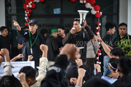 FOTO: Aksi tolak pengesahan Revisi UU Pilkada di Kotamobagu