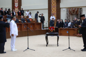 Abdullah Mokoginta dilantik sebagai Penjabat Wali Kota Kotamobagu, (Foto: Diskominfo KK).