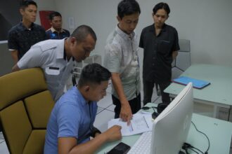 Kemenkominfo Lakukan Survei Layanan Panggilan Darurat 112 di Diskominfo Kotamobagu, (Foto: Diskominfo KK).