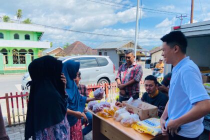 Pemkot Kotamobagu Gelar Gerakan Pangan Murah di Desa Kobo Kecil, (ZONAUTARA.com/Sajidin Kandoli).