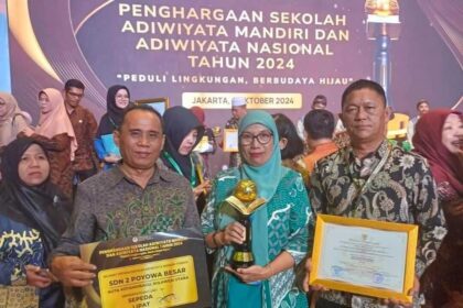 SDN 2 Poyowa Besar, Kecamatan Kotamobagu Selatan, kembali mencetak prestasi gemilang dengan meraih Piala Adiwiyata Mandiri, (Foto: Diskominfo KK).