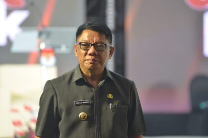 Pj Wali Kota Kotamobagu, Abdullah Mokoginta, (Foto: ZONAUTARA.com/Yegar Sahaduta).