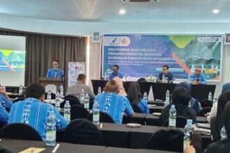 Asisten ii bidang pembangunan dan ekonomi pemerintah, adnan masinae, resmi membuka ‘monitoring dan evaluasi program prioritas nasional keamanan pangan kota kotamobagu', (foto: zonautara. Com/sajidin kandoli).