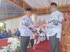 Kepala Dinas Pendidikan, Aljufri Ngandu, (kiri) dan Pj Wali Kota Kotamobagu, Abdullah Mokoginta, (kanan), (Foto: ZONAUTARA.com/Sajidin Kandoli).