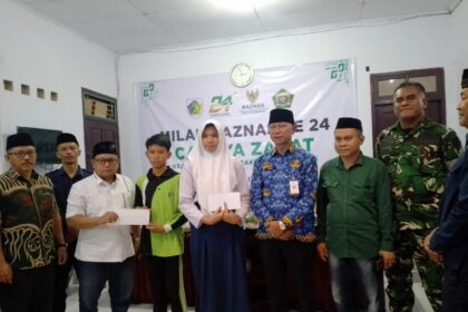 Baznas Kotamobagu serahkan beasiswa berprestasi dan rumah layak huni