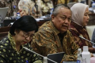 BI Naikkan BI Rate, Perry Minta Bank Tahan Bunga Kredit
