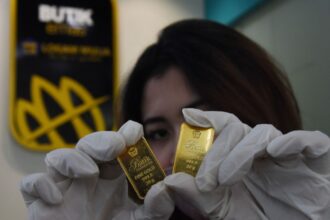 Harga Emas Antam Hari Ini Turun ke Rp2.798.000