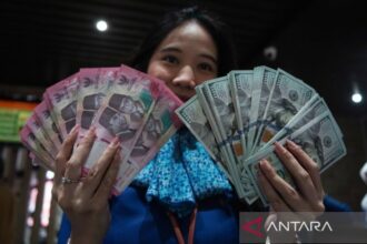 Rupiah Naik ke Rp18.134 per Dolar AS Selasa Pagi